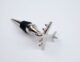 stocking stuffer gift idea of chrome wine stopper in the shape of a retro airplane