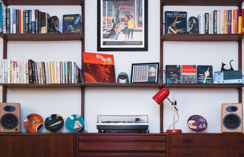 mid century bookshelf full of mid century collections