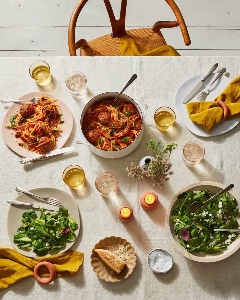 Table top with Food52 products and salad