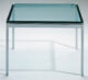 Glass and steel square coffee table