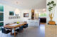 Mid Century Modern dining room with Eames bar stools and a Nelson pear bubble lamp, a custom walnut table and JW01 dining chairs by Jakob Wagner