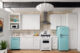 Blue dishwasher and refrigerator in kitchen space