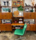 Mid Century Modern wall unit with desk and turquoise office chair at Uptown Modern in Austin, Texas