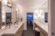 A bathroom with a makeup vanity