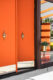 orange door with starburst knobs