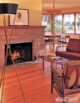 natural stone fireplace surround with tripod floor lamp