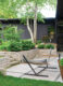 patio with hammock in backyard of modern Milwaukee home