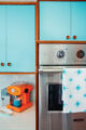 turquoise and orange 1960s renovated kitchen