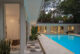 MCM Florida home pool with pool deck of hexagonal tile