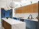 Palm Springs kitchen with blue and wood cabinetry and appliances