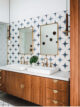 bathroom with blue starbursts on white tile